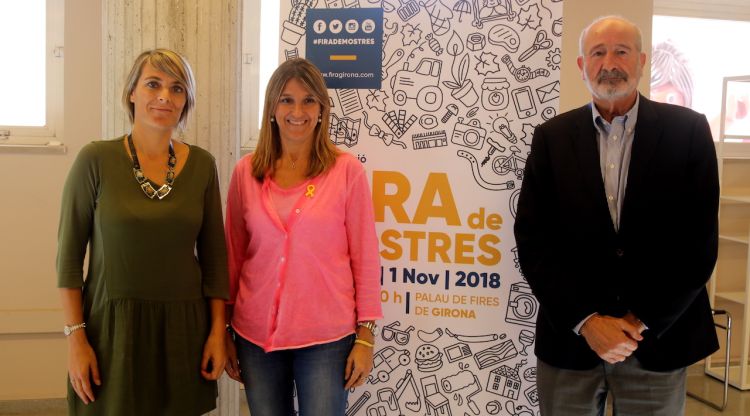 La directora de Fira de Girona, Coralí Cunyat; la regidora de Promoció Econòmica, Glòria Plana, i el president de la Fira, Domènec Espadalé. ACN