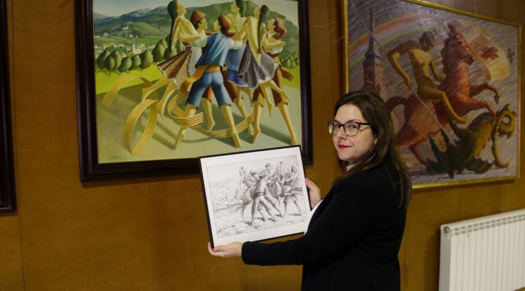 Laura Basagaña mostrant un dibuix de Fossas. ACN